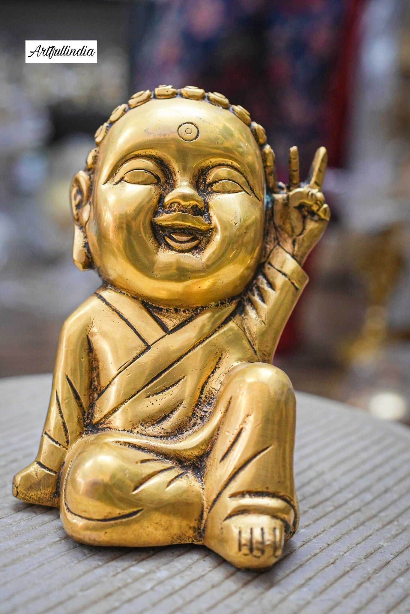 Handcrafted Brass Buddha Statue – Playful Pose for Joyful Decor & Meditation
